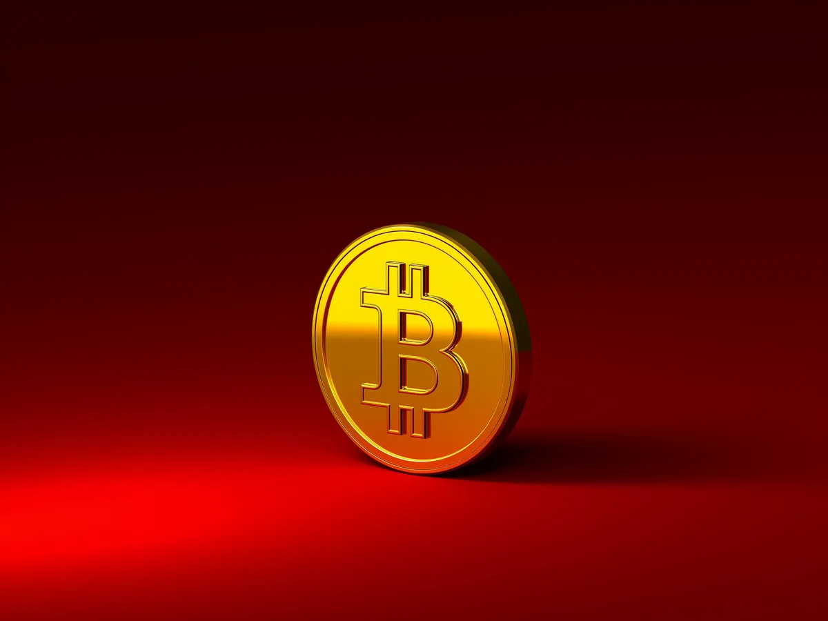 ビットコインのシンボルが刻まれたコインのイメージ