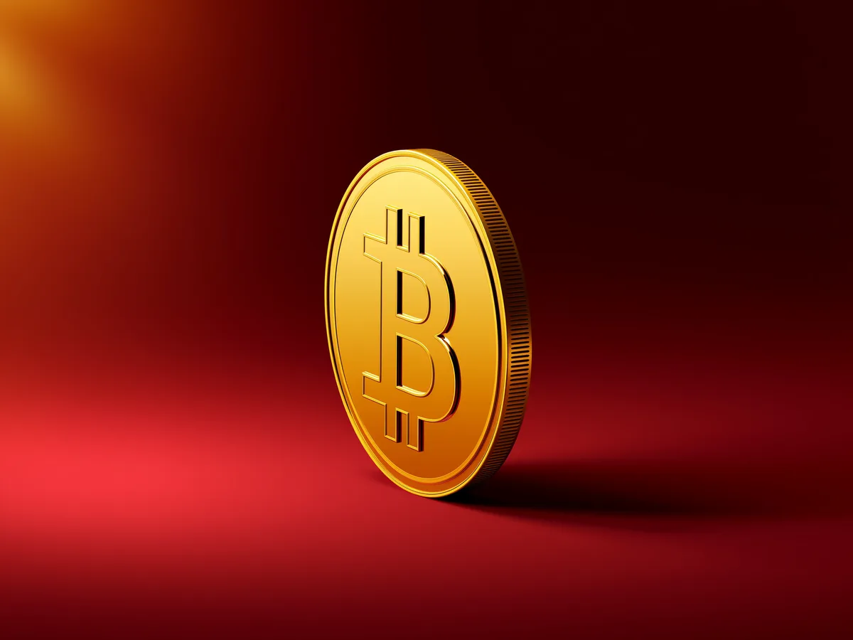 ビットコインのシンボルが刻まれたコインのイメージ