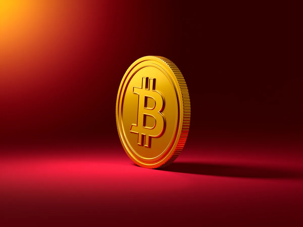 ビットコインのシンボルが刻まれたコインのイメージ